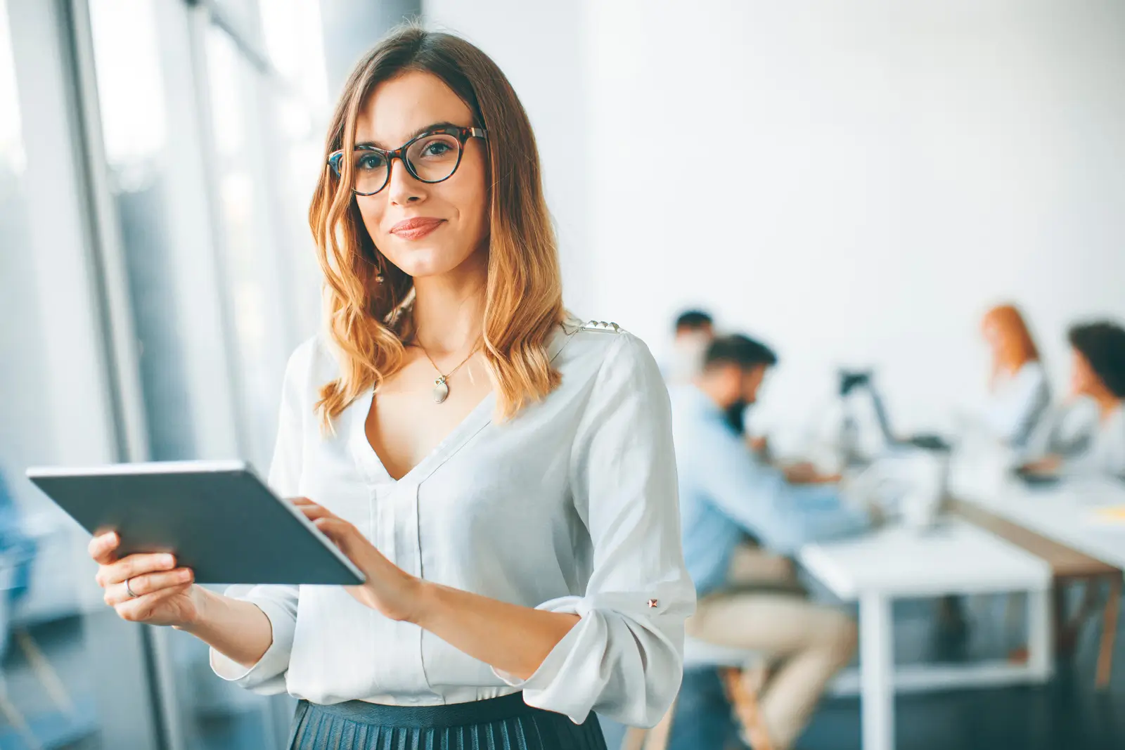 Empresária que possui controle financeiro empresarial